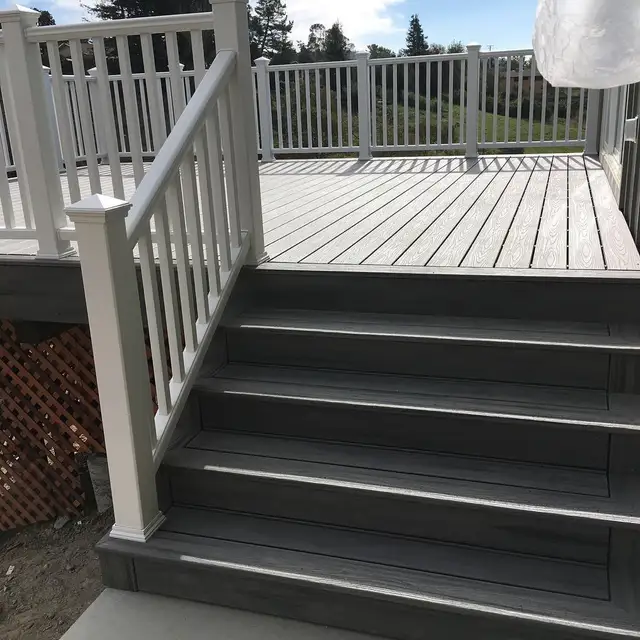Elevated gray Trex composite deck with picture-frame border and white railing on a Santa Rosa hillside home