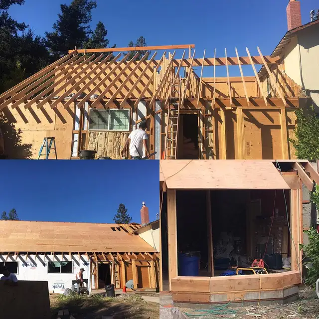 Exposed roof rafters and Tyvek-wrapped walls on a residential addition under construction in Sonoma County